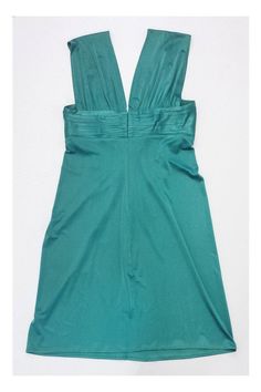 Size X-Small Green Sleeveless Dress Body 96% Acetate 4% Spandex Lining 84% Polyester 16% Spandex Slips on Pleated bust Plunge neckline 1 small pull on the front near bust and 1 on the back Underarm to underarm 14.5" Roomy waist & hip area Total length 34" Sleeveless Stretch Mini Dress With Ruched Bodice, Stretch Sleeveless Mini Dress With Ruched Bodice, Sleeveless Mini Dress With Ruched Bodice, Green Fitted Sleeveless V-neck Dress, Fitted Green Sleeveless V-neck Dress, Green Stretch Mini Dress For Formal Occasions, Green Formal Mini Dress With Stretch Fit, Fitted Sleeveless V-neck Dress With Ruched Bodice, Stretch Sleeveless Elastane Dress For Formal Occasions