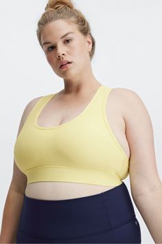 On-The-Go Medium Impact Sports Bra Fabletics yellow female Activewear >> Womens >> Sports Bras >> Medium Impact plus Training 4-Way Stretch/Pockets/Removable Bra Cups Our fan-favorite pocket bra SHOP ALL On-The-Go Yellow Stretch Activewear With Light Support, Yellow Stretch Sports Bra, Yellow Stretch Sports Bra Athleisure, Yellow Go-dry Activewear For Sports, Yellow Breathable Activewear For Sports, Yellow Moisture-wicking Activewear For Workout, Functional Yellow Activewear For Training, Yellow Functional Activewear For Training, Functional Yellow Training Activewear