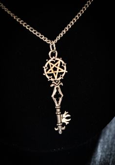 Symbolising the Key to the gate of King Solomon's occult learning and arcane knowledge. This magickal pendant is reputed to bestow upon its wearer the power of sorcery and should be used with the Wisdom of Solomon. Plated in silver and gold, decorated with enamelling and crystals. Each pendant comes with a chain and is presented in a black velvet pouch. Wisdom Of Solomon, Key Of Solomon, King Solomon, The Wisdom, Velvet Pouch, Silver And Gold, Black Velvet, Pendant Necklaces, Cross Necklace