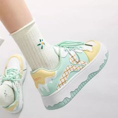 These sneakers feature a playful ice cream-inspired design with pastel colors arranged in a grid pattern, highlighted by whimsical drips and wavy soles for a fun and youthful look. Material: Vegan Leather Run small, please review the sizing information Sailor Moon Custom Shoes, Cute Spring Sneakers, Cute Roller Blades, Colorful Sneakers Ideas, City Pop Fashion, Pastel Core Outfits, Celestial Shoes, Kawaii Shoes Sneakers, Cute Platform Sneakers