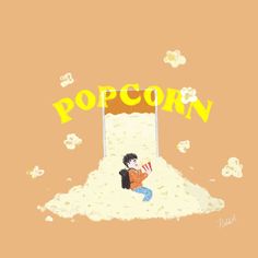 a child sitting on top of a pile of popcorn in front of the word popcorn