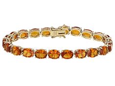 20.76ctw oval Madiera citrine 18k yellow gold over sterling silver bracelet. Measures approximately .24"W. Hidden box clasp. Orange Diamond Bracelet, Bracelets Orange, Box Clasp, Citrine Stone, Dainty Bracelets, Hermes Bags, Dainty Earrings, Sterling Silver Bracelet, Orange Gold