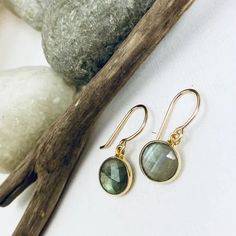 The perfect everyday earring is here! Choose your favorite gemstone bezeled in gold vermeil finished with a 14k gold filled ear wire. These simple beauties are the perfect earring you will never want to take off! From our Gems and Details Collection. #everydayearring #crystalaccents #timeless •14k gold filled with vermeil •Choice of Moonstone, Labradorite, Tourmilated Quartz, Turquoise, or Chalcedony •Stone is about 9mmFrom our Gems and Details Collection. Dainty Everyday Gemstone Earrings, Everyday 14k Gold-filled Gemstone Earrings, Everyday 14k Gold Filled Gemstone Earrings, Everyday Yellow Gold Earrings With Gemstone, Gold Faceted 14k Gold-filled Earrings, Faceted 14k Gold Filled Yellow Gold Earrings, Minimalist Faceted Everyday Earrings, Dainty Faceted Yellow Gold Earrings, Minimalist Everyday Faceted Earrings