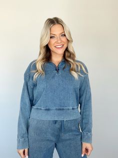 Elevate your casual wardrobe with our Dressed Down Denim Zip Up. Featuring a collared neckline and drop shoulders, this quarter zip top offers a relaxed fit for comfort and style. The cropped length adds a trendy touch, making it the perfect choice for shopping or a chic brunch. Versatile and effortlessly cool in classic denim. * Dressed down denim pants sold separately Self 80% Cotton 18% Polyester 2% Spandex Hand wash cold. Relaxed Fit Half-zip Spring Top, Spring Relaxed Fit Half-zip Top, Spring Half-zip Top With Relaxed Fit, Medium Wash Cropped Denim Top In Relaxed Fit, Medium Wash Cropped Denim Top Relaxed Fit, Cropped Medium Wash Denim Top With Relaxed Fit, Rib Cage, Dressed Down, Zip Top