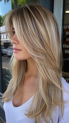 Revamp your long locks with front layers and a shadow root, the epitome of modern style and sophistication for 2024. These face-framing layers with a shadow root add depth and dimension, enhancing your natural beauty with a touch of edge. Click the pin and follow us for more top style trends! #Haircuts #Hairstyle #LongHair #FrontLayers #StyleTrends Butterfly Haircut Blonde, Front Layers Long Hair Face Framing, Blonde Root Shadow, Heavy Layers Medium Hair, U Cut Hair, Front Blond, Edgy Butterfly, Butterfly Haircuts, Curling Tips