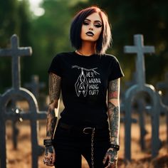 This unisex heavy cotton tee is the basic staple of any goth/emo/alternative individual's wardrobe.  The classic fit of this tshirt ensures a comfy relaxed wear, and is made of 100% cotton for year-round comfort that is sustainable and highly durable. The tear-away label means a scratch-free experience with no irritation or discomfort whatsoever. T-shirts are printed and shipped from the UK, and come in sizes S-5XL! Edgy Halloween T-shirt For Alternative Fashion, Alternative Style Cotton T-shirt For Cosplay, Emo Halloween T-shirt For Streetwear, Edgy Halloween Concert T-shirt, Alternative Halloween T-shirt With Letter Print, Emo Cosplay T-shirt With Crew Neck, Halloween Cosplay Alternative Style T-shirt, Alternative Halloween Cosplay T-shirt, Alternative Style Halloween Cosplay T-shirt