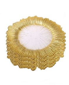 a gold plate that has been made to look like it is in the shape of a flower