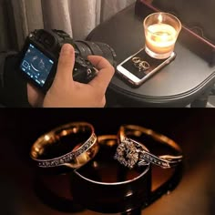 there are two different types of rings on the table and one is holding a cell phone