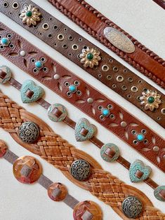 Vintage Concho Belt Leather vegan suede heart star Silver turquoise skinny SCROLL DOWN 4 Info ....CHOOSE ONE (of 6)  1. Tony Lama Scrolled Silver Buckle stay tip, Brown woven edges, Silver floral scrolled ovals, 35x 1 1/4", 5 holes: 28-31", $68   2. Silver Buckle/stay, Brown cowhide Hip Belt, Silver&green flowers, rivets, 47.5x 1 3/8", 10 holes: 35.5- 43.5", $72  3. Brushed silver Buckle/leather stay, India, wide Brown Leather Hip Belt, studs rivets, Turquoise spots, 45.5x 1 3/8", 5 holes: 35-42 Vintage Adjustable Turquoise Belt, Adjustable Vintage Turquoise Belt, Adjustable Turquoise Vintage Belt, Brown Hand Tooled Bohemian Belts, Handmade Brown Western Belt, Rustic Adjustable Belt With Concho Detail, Rustic Adjustable Concho Belt, Bohemian Brown Belt For Ranch, Boho Belts