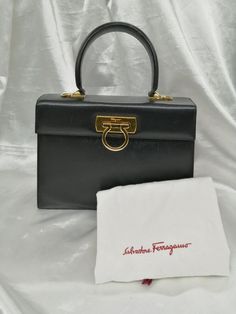 #ad Find ideas�and inspiration for Salvatore Ferragamo 2WAY Handbag Black 9.4 inch Women's, bags Designer Briefcase With Detachable Handle, Designer Satchel Briefcase With Detachable Handle, Classic Handheld Flap Bag For Shopping, Designer Black Flap Bag With Top Carry Handle, Travel Top Handle Flap Bag, Black Shoulder Flap Bag With Handles, Classic Rectangular Flap Bag With Handles, Black Handheld Flap Bag For Formal Occasions, Designer Black Briefcase With Detachable Handle