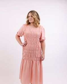 This Blush Dress is the perfect way to look your best! Crafted with soft cotton fabric, it fits perfectly at the waist and its beautiful blush hue adds a subtle elegance. Feel amazing and look stunning in this gorgeous dress! A must-have! Round out your vacation and weekend wardrobe with this plus size dress BeReal Blush Cotton Blend Pink Woven Midi Dress | Pink | Dresses | Materials & Care Instructions: ['80% Cotton, 20% Polyester', 'Machine wash', 'Imported'] Spring Peach Dress With Smocked Back, Summer Pink Midi Dress With Gathered Waist, Pink Midi Dress With Gathered Waist, Chic Pink Dress With Gathered Waist, Pink Gathered Waist Dress For Brunch, Pink Dress With Gathered Waist For Daywear, Pink Dress With Gathered Waist For Brunch, Modest Spring Dress With Ruched Detail, Modest Ruched Dress For Spring