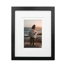 PRICES MAY VARY. USE AND DISPLAY: Our black 8x10 frame is perfect for showing 8X10 inch picture or print, also for 4X6 inch or 5X7 inch picture with mat.It is a great choice not only for decorating house, office, hotel, restaurant, coffee shop, but also perfect for giving to your friends, relatives, or someone else as for Valentines Day gifts, Christmas gifts, Anniversary gifts, Mothers' Day gifts, Fathers' Day gifts, Birthday gifts etc. MATERIAL: The black 8x10 picture frame is made of high-qua Black Picture Frame Table Top, Black Picture Frames On Wall Acrylic, Modern Black Picture Frames, Black Matted Picture Frame, Father And Son Picture Frames, Table Top Frame, 4x6 Picture Frames, Tabletop Picture Frames, 8x10 Picture Frames