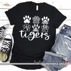 a t - shirt that says tigers with paw prints