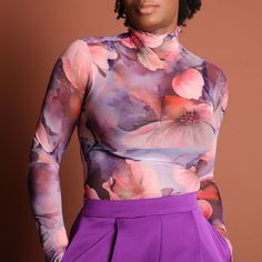 Elysia Sheer Long Sleeve Floral Bodysuit - Purple Tops Mo'Nique Couture Fashions Small Purple Sheer Fitted Bodysuit For Fall, Fitted Sheer Bodysuit For Fall, Second-skin Long Sleeve Bodysuit For Spring, Feminine Fitted Spring Bodysuit, Pink Second-skin Bodysuit For Spring, Chic Purple Bodysuit For Spring, Floral Print Fitted Bodysuit, Fitted Floral Print Bodysuit, Feminine Long Sleeve Fitted Bodysuit