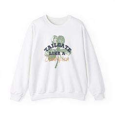 Are you a Notre Dame football fan?  If so this is the perfect item for your tailgate Saturdays. Tailgate like a CHAMPION in style with this cozy Crew-Neck and show your support for the Fighting Irish. Ideal for any situation, a unisex heavy blend crewneck sweatshirt is pure comfort. These garments are made from polyester and cotton. This combination helps designs come out looking fresh and beautiful. The collar is ribbed knit, so it retains its shape even after washing. There are no itchy side seams on these sweaters.  .: 50% cotton, 50% polyester .: Medium-heavy fabric (8.0 oz/yd² (271.25 g/m .: Loose fit .: Sewn-in label .: Runs true to size Collegiate Crew Neck Sweatshirt Fan Gear, Collegiate Crew Neck Sweatshirt For Fan Gear, Fall Game Day Crew Neck Sweatshirt, Fall Fan Gear Sweatshirt With Crew Neck, Varsity Team-colored Crew Neck Sweatshirt, Varsity Sweatshirt For Football Season Streetwear, Game Day Football Season Crew Neck Sweatshirt, Football Season Game Day Crew Neck Sweatshirt, Collegiate Sweatshirt For Football Season