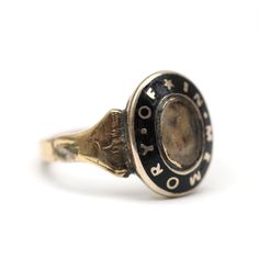 "Exquisite 10k gold and black enamel Victorian hair locket mourning ring. Ring face measures 12mm x 9.5mm and the words \"IN MEMORY OF\" encircle the memento locket. The enamel has been impeccably preserved. Ring size 3.24. Sizing available Layaway available" Antique White Gold Jewelry For Commemoration, Heirloom Style Signet Ring With Black Enamel As Gift, Heirloom Style Hallmarked Engraved Ring For Memorial, Heirloom Signet Ring For Commemoration, Heirloom Round Signet Ring For Commemoration, Heirloom Engraved Ring With Polished Finish For Commemoration, Heirloom Engraved Signet Ring For Memorial, Heirloom Oval Engraved Enamel Ring, Heirloom Memorial Engraved Signet Ring