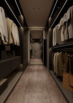 an empty walk - in closet with clothes on shelves