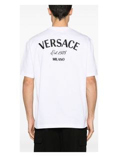 Hey there. If you’re on the hunt for a versatile and stylish tee, this might just be the one for you. It’s a staple from the Versace clothing line, combining comfort with a dash of luxury. Crafted from 100% cotton for that soft, breathable feel. Features a simple crew neckline and short sleeves for classic style. Embroidered logo adds a touch of vibrancy to your look. Exclusive Versace Milano stamp at the back for a luxe finish. Authenticity QR code to ensure it’s the real deal. | Versace Men's Stamp Embroidery, Cloud White, Qr Code, Versace, Stamp, Crew Neck, Embroidery, T Shirt, White