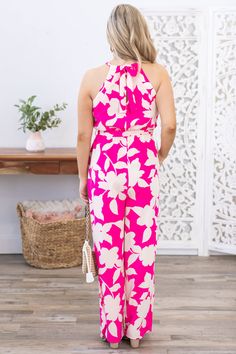 Product Details Colors: Hot Pink, Light Peach Print: Floral Neckline: Halter Sleeve: Sleeveless Hemline: Straight Brand: Onetheland Material and Care 100% Polyester Dry Clean Only Size and Fit Small: Bust 34" Waist 24/28" Length 56" Rise 14" Inseam 27.5" Medium: Bust 36" Waist 26/28" Length 56.5" Rise 15" Inseam 27.5" Large: Bust 38" Waist 28/32" Length 57" Rise 15.5" Inseam 28" Photo model is 5'4 and wearing a size small Video model is 5’8 and wearing size small Pink Halter Neck Jumpsuits And Rompers For Beach, Pink Halter Neck Jumpsuit For Beach, Pink Halter Neck Jumpsuits And Rompers For Vacation, Pink Halter Neck Jumpsuit For Vacation, Pink Halter Neck Jumpsuit For The Beach, Sleeveless Pink Jumpsuits And Rompers For Beach Season, Pink Sleeveless Summer Jumpsuits And Rompers, Pink Sleeveless Summer Jumpsuit, Beach Season Floral Print Halter Neck Jumpsuits And Rompers