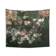 an image of flowers that are in the middle of a wall hanging on a wall