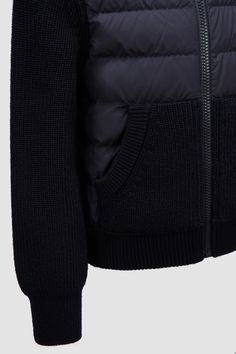 Worn alone during the milder months or layered under outerwear, this padded cardigan is designed to keep kids warm. The mid-weight knit is crafted from ultra-fine Merino wool. Black Cashmere Outerwear With Ribbed Cuffs, Merino Wool Long Sleeve Outerwear For Cold Weather, Black Merino Wool Outerwear With Ribbed Cuffs, Winter Merino Wool Cardigan With Ribbed Cuffs, Cozy Wool Outerwear With Ribbed Cuffs, Knit Outerwear With Ribbed Cuffs For Winter, Cozy Merino Wool Outerwear For Cold Weather, Cozy Merino Wool Outerwear With Ribbed Cuffs, Winter Cashmere Knit Outerwear