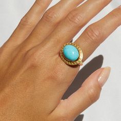 Our Sleeping Beauty Turquoise Celestial Cocktail Ring is back in Stock and available in size 7. From Elizabeth Moore's Signature Celestial Collection created in recycled 18K Yellow Gold in the heart of New York's Diamond District. Diam: 12.80 x 17 Sleeping Beauty Turquoise from AZ Handcrafted in New York City To find your perfect fit, check out our complementary Ring Sizer. Celestial Style Oval Cabochon Gemstone Ring, Celestial Oval Cabochon Gemstone Rings, Celestial Style Cabochon Yellow Gold Rings, Celestial Yellow Gold Cabochon Rings, Fine Jewelry Turquoise Birthstone Ring, Gold Turquoise Ring With Gemstone Accents, Turquoise Open Ring Fine Jewelry, Fine Jewelry Turquoise Open Ring, Turquoise Rings With Gemstone Accents In Fine Jewelry Style