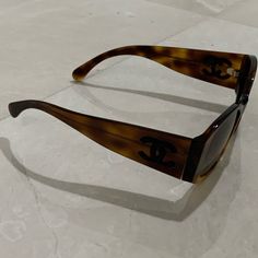 Chanel Oval - Acetate, Dark Tortoise Sunglasses Acetate Dark Tortoise. Lenses: Brown Hand-Stitched Cc On Temples 100% Uva And Uvb Protection Ce - Lenses Are Uv Category Filter 3 - Prescription Friendly 5450-A C.1696/S5 54017 140. Made In Italy Floor Model In Like New Condition. There Is No Box. Brown Acetate Sunglasses With Uv Protection, Luxury Brown Oval Sunglasses, Brown Acetate Sunglasses With Uva Protection, Luxury Brown Tinted Sunglasses, Chanel Vintage Sunglasses Brown, Brown Hand, Chanel Accessories, Tortoise Sunglasses, Colored Sunglasses