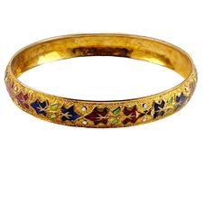 Showcase your style with this Asian-inspired Cloisonne Enamel Bangle Bracelet. Featuring a leaf motif, it adds a vibrant pop of blue, red, green, and gold to any outfit. Made from gold-plated metal and enamel. * Asian-inspired design * Leaf motif  * Vibrant blue, red, green, and gold colors * Made from gold-plated metal and enamel * Interior dimension 2&1/2" Features: * Asian Size: Womens Interior Dimension 2&1/2" Condition: Pre-Owned Good Vintage Multicolor Bracelets For Festive Occasions, Multicolor Enamel Bangle Bracelets, Adjustable Enamel Bangle, Traditional Adjustable Enamel Bracelets, Red Enamel Bangle Jewelry, Red Enamel Bangle Bracelet, Red Enamel Bangle Bracelets, Vintage Multicolor Enamel Bangle, Handmade Multicolor Enamel Bracelets