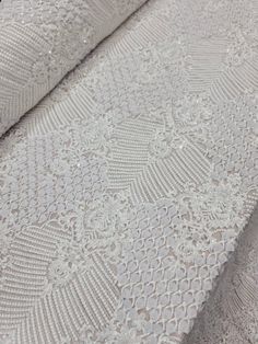 "52\" W Off White Bridal Lace Embroidered Floral Flower  - This product is sold per yard.  - Buy as many yards as you need. - Contact us if you need more yardage or if you need a customize order.   - We offer swatches too.  Ask us how? -We are glad to offer special bulk and wholesale pricing.  Please contact us with the fabric you are interested in  and we will work with you to get the best deal. - U.S. Seller PS. Please note that some irregularities in the pictures such as color are due to ligh Elegant White Embroidered Fabric With 3d Embroidery, Elegant White Fabric With 3d Embroidery, Elegant White 3d Embroidered Fabric, White Pearl Embroidered Fabric For Mother Of The Bride, Wedding Lace Fabric With 3d Embroidery, Elegant 3d Embroidery Lace For Wedding, Elegant 3d Embroidered Lace For Wedding, Elegant Wedding Lace With 3d Embroidery, Elegant Embroidered Lace Baptism Dress