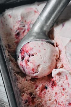 two scoops of ice cream in a metal container