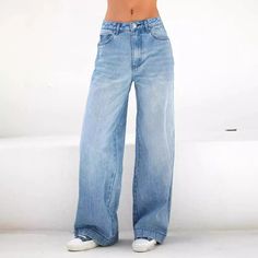 You're a free spirit who loves to feel the wind in your hair and the sand between your toes. That's why you'll love Boho Beach Hut's high waist wide leg loose denim jeans. These jeans are perfect for days when you want to feel comfortable and relaxed but still look stylish. Made from soft and lightweight fabric, these jeans give you plenty of room to move without feeling restricted. The high waist is flattering on any body type, while the wide leg adds an extra bit of boho flair. Pair them with Summer High Rise Baggy Wide Leg Pants, Bohemian High Waist Flare Jeans For Summer, Baggy Light Wash Flare Jeans For Summer, Light Wash Baggy Flare Jeans For Summer, Summer Baggy Light Wash Flare Jeans, Bohemian Wide Leg Summer Jeans, Bohemian High Rise Denim Blue Bottoms, Bohemian Wide Leg Light Wash Bottoms, Bohemian Light Wash Wide Leg Bottoms