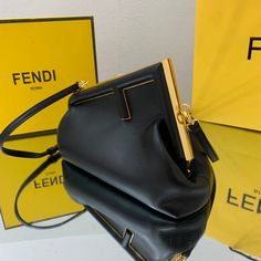 Description FND First Small Black For Women, Women’s HandBags, Shoulder And Crossbody Bags 10.2in/26cm FF 8BP129ABVEF0KUR Rep 1:1 Small FND First bag made of soft, black nappa with oversized metal F clasp with tone on tone nappa bands. Can be carried by hand as a clutch or worn on the shoulder thanks to the detachable shoulder strap. 26 x 9.5 x 18 cm / 10.2 x 3.7 x 7.1 inches (Length x height x width) Featuring an internal compartment lined in an iconic FF motif fabric Pull out internal attachme Tone On Tone, One Bag, Fendi Bags, Soft Black, Gold Finish, Monaco, Bag Making, Crossbody Bags, Clutch Bag