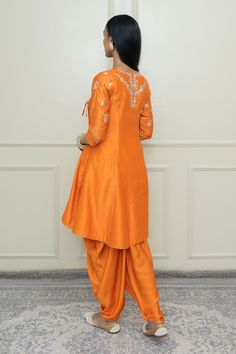 Buy Sheetal Batra Orange Silk Chanderi Angrakha Set Online | Aza Fashions Orange Angrakha, Sheetal Batra, Kashmiri Tilla Embroidery, Banarsi Fabric, Tilla Embroidery, Gota Work, Dhoti Pants, Organza Dupatta, Embroidered Neckline