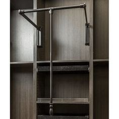 an open bookcase with shelves and drawers in dark wood, with metal bars on each side