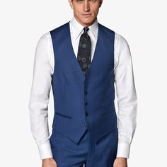 Mid blue waistcoat with a slim fit, featuring a V-neck collar, jetted pockets, single-breasted 5-button closure, and a rear cinch for an adjustable fit. Elegant Blue V-neck Vest, Business Vest With Single Button Sleeveless, Business Vest With Single Button, Business Sleeveless Vest With Single Button, Formal Blue V-neck Outerwear, Fitted V-neck Outerwear With Single Button, Blue Slim Fit Three-piece Suit With Single Button, Blue Three-piece Suit For Business Casual, Semi-formal Single-breasted Vest With Lapel Collar