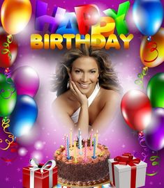 a woman sitting in front of a birthday cake