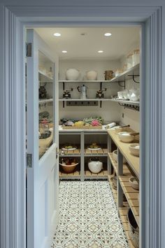 an open pantry with lots of food on the shelves