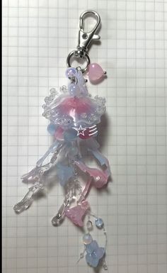 a key chain with many charms attached to it