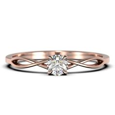 a rose gold engagement ring with a diamond in the center