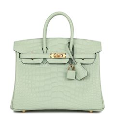 This Birkin is in Vert D'Eau matte Mississippienis alligator leather with gold hardware and has tonal stitching, front strap, two straps with center toggle closure, clochette with lock and two keys and double rolled handles. The interior is lined with Vert D'Eau chevre and has one zip pocket with an Hermes engraved zipper pull and an open pocket on the opposite side. Payment for this item is by Bank Wire only unless other arrangements have been made. Collection: UOrigin: FranceCondition: Pristin Hermes Bags Birkin, Birkin Bags, Hermes Birkin Handbags, Hermes Birkin 25, Hermes Box, Birkin 25, Hermes Bags, Hermes Bag, Sierra Leone