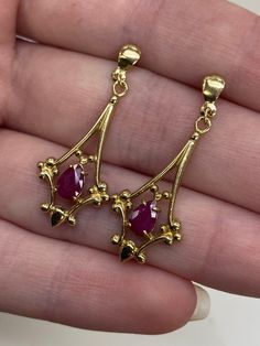 9carat yellow gold ruby drop filigree earrings  Weight: 2.6grams  Price: £295.00 Replacement price: £450.00 All articles come presented in a gift box Filigree Gold Jewellery, Classic Ruby Earrings In Yellow Gold, Classic Gold Ruby Earrings, Ruby Earrings With Intricate Design As Gift, Gold Ruby Earrings, Pierced, Elegant Ruby Earrings In Yellow Gold, Formal Ruby Earrings With Intricate Design, Formal Ruby Earrings In Yellow Gold, Elegant Yellow Gold Ruby Earrings