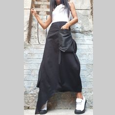 "Asymmetric long black skirt🤩 Extravagant designs and high quality fabrics. The item from the pictures is size S For more information feel free to ask questions. Material &Care Cotton textiles end polyester Hand wash at low temperatures Do not machine dry Do not iron Do not dry clean Sizing We make size from xs to 5xl as well as customized measures.So don't hesitate to contact us and make one for you. 🛫🎁Shipping🎁 🛬 STANDARD SHIPPING Europe : 6-8 business days USA&Canada : 8-10 busin Asymmetrical Black Skirt For Evening, Black Asymmetrical Skirt For Evening, Black Asymmetrical Hem Bottoms For Evening, Black Wrap Skirt With Asymmetrical Hem For Party, Black Asymmetrical Hem Wrap Skirt For Party, Black Asymmetrical Maxi Skirt For Summer, Black Draped Skirt With Asymmetrical Hem For Summer, Black Draped Skirt With Asymmetrical Hem For Spring, Black Long Wrap Skirt For Evening