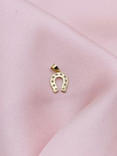 ❤️ 10k gold miniature horseshoe charm pendant  ❤️White cubic zirconia charm   ❤️ Length 20mm ❤️ Fine jewelry  ❤️ Dije de la herradura miniatura de 10 milímetros  ❤️ Joyería fina  ❤️ Oro 10 kilates SKU 10283 ❤️ 10k gold miniature infinity charm pendant  ❤️White cubic zirconia charm   ❤️ Length 9mm x 11mm ❤️ Fine jewelry  ❤️ Dije de infinito miniatura de 9 milímetros de oro  ❤️ Joyería fina ❤️ Oro de 10 Kilates  ❤️ Piedra blanca zirconia SKU 10423 Dainty Horseshoe Jewelry For Gifts, Gold Horseshoe Charm Necklace For Gift, Elegant Horse Design Pendant Jewelry, Gold Horse Design Pendant Necklace, Horse Pendant Necklace, Infinity Charm, 10k Gold, Real Gold, Gold Pendant