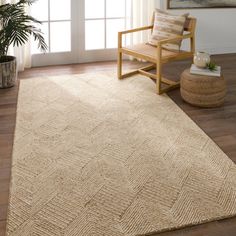 This hand-tufted rug provides rich texture and global appeal through the unique geometric pattern and looped jute and wool fibers. The neutral tan and ivory colorway adds to any indoor, modern space. Jute works best in low traffic areas of the home such as formal living rooms, bedrooms, and formal dining spaces. Dakota Fields Rug Size: Rectangle 10' x 14' | Beige Rectangle 10' x 14' Area Rug - Dakota Fields Oisin Solid Color Hand Tufted Wool / Jute Area Rug in 168.0 x 120.0 x 0.5 in brownWool | Boho Office Rug, Beige Living Room Rug, Neutral Runner Rug, Tan Rug Living Room, Area Rugs Over Carpet Living Room, Brown Rug Texture, Neutral Rugs Living Room, Amazon Area Rugs, Modern Bedroom Rug