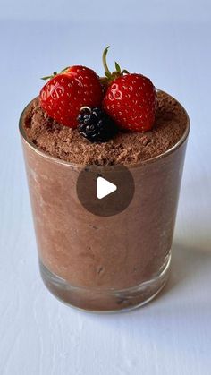 a chocolate dessert with two strawberries on top is shown in a video screen shot