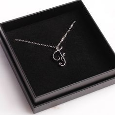 "F Initial Pendant Necklace / Dainty Silver Necklace / Custom Necklace / Name Silver Necklace / Personalized silver necklace / Letter F Dainty \"F\" initial. Perfect every day necklace. Lovely gift for your self, sister, bridesmaids, new mom. Convo me if you would like to customize the length of the chain. The possibilities are endless. Pendant: Base metal is brass and silver plated. Chain is 18 inches, sterling silver. (if you would like a longer or shorter chain, please contact us to customize F Necklace Letter, F Initial Necklace, Mother's Day Silver Initial Pendant Necklace, Silver Initial Pendant Necklace Nickel Free, Silver Initial Pendant Clavicle Chain Necklace, Silver Initial Pendant Necklace Gift, Silver Initial Pendant Necklace, Gift For Her, Silver Chain Initial Pendant Necklace As Gift, Personalized Sterling Silver Clavicle Chain Charm Necklaces