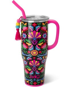 a colorful cup with a tasseled lid and handle is shown on a white background