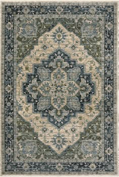 a blue and beige rug with an ornate design