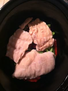 some meat and vegetables in a crock pot