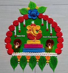 this is an image of a colorful rangolite decoration for diwaling on the occasion